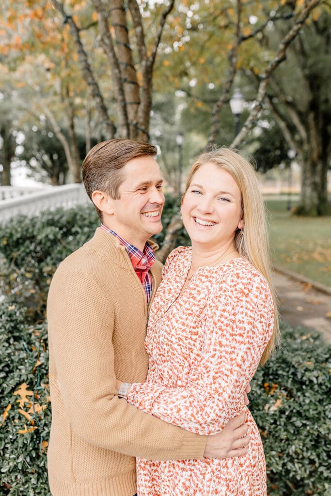Smiling couple in downtown Roswell, GA - Fall Family Photoshoot