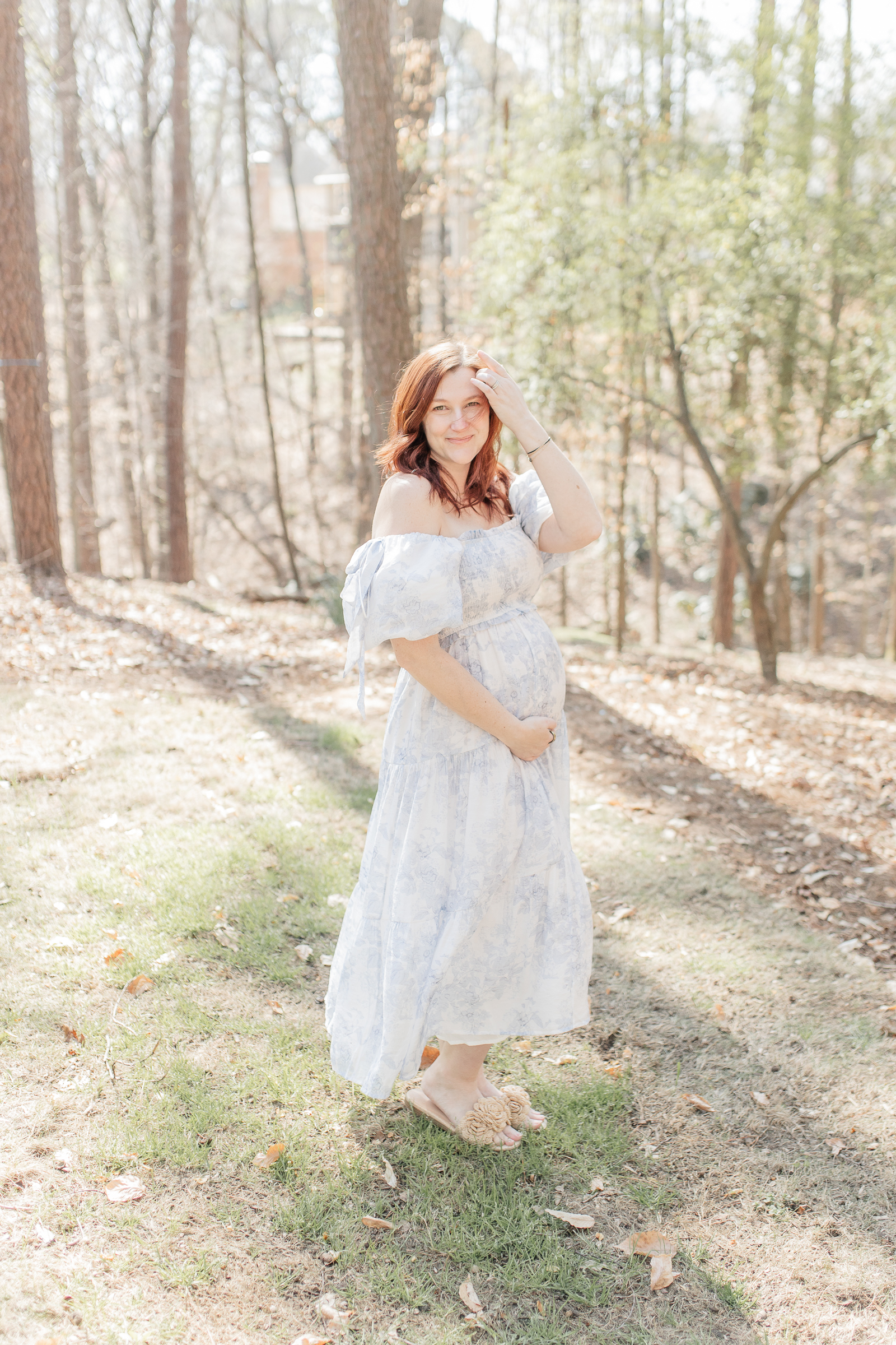 Outdoor maternity portrait of expecting mother and family in Alpharetta, GA